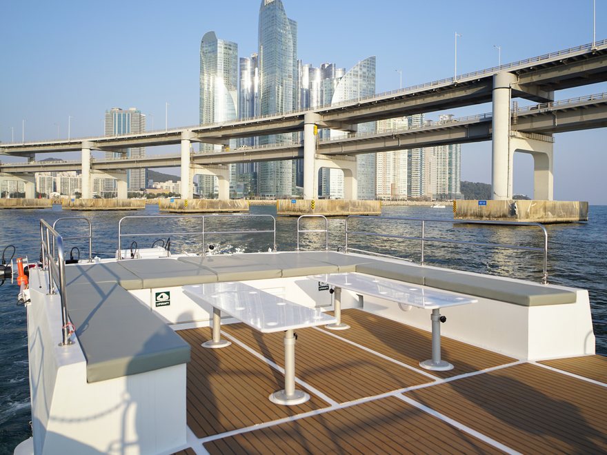 The 2F open-air rooftop deck with a sunshade