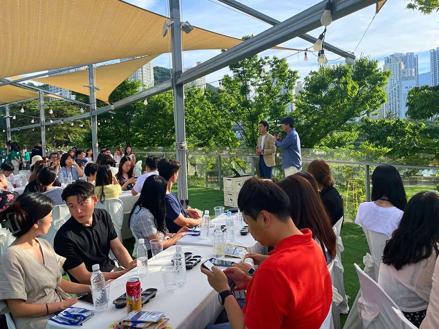 Rooftop seats with tables under sunshades