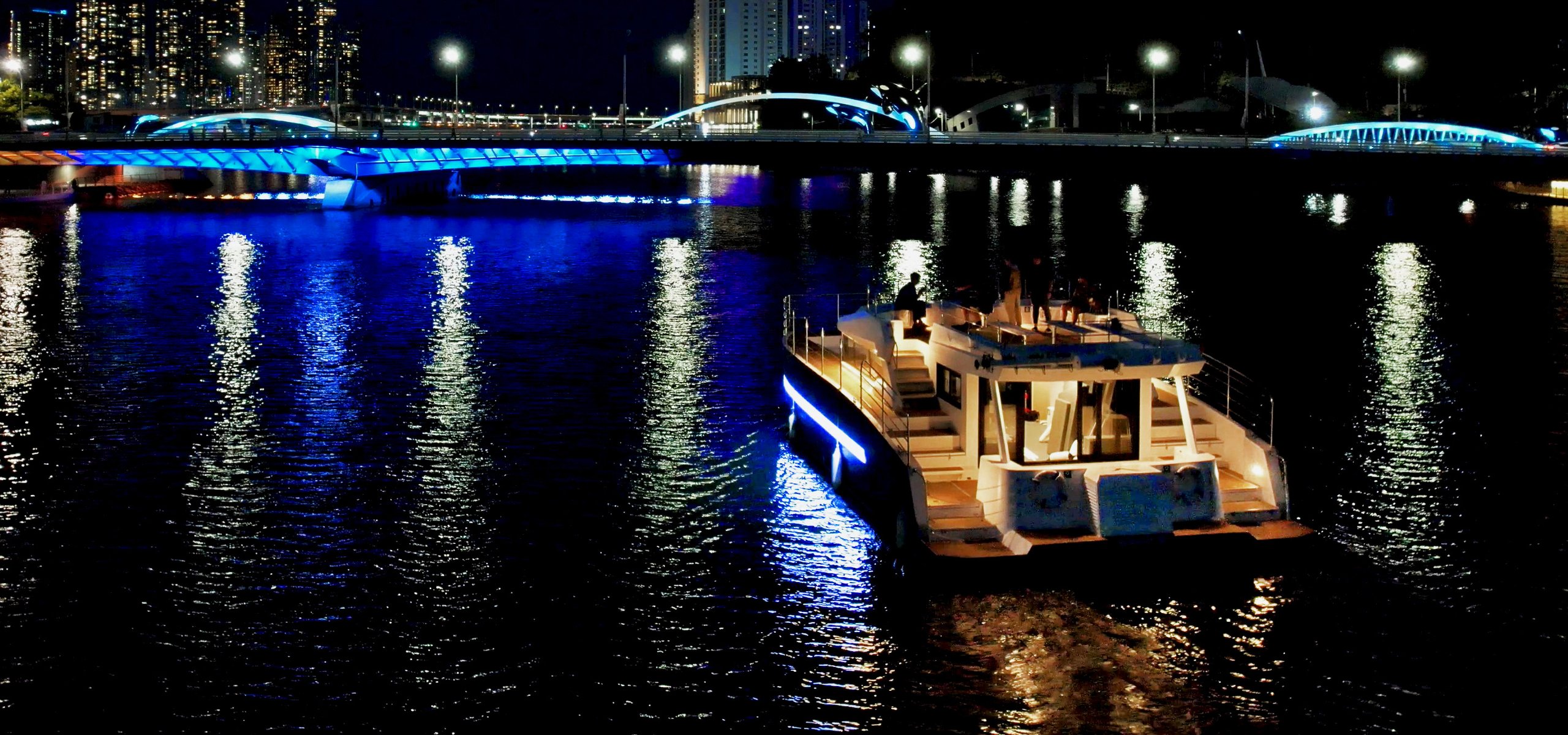 Cruise lit up against the Busan night sea