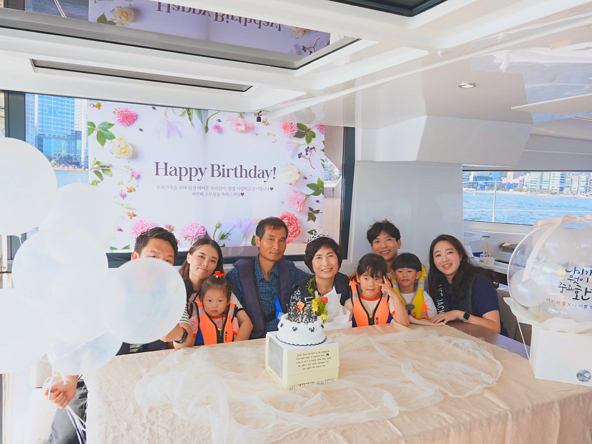 A family celebrating a birthday in the cabin