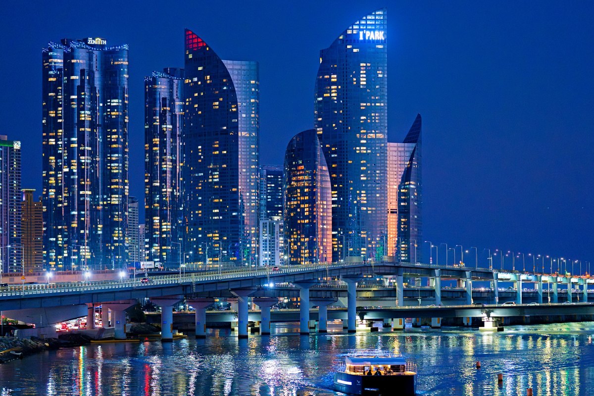 Night cruise sailing past Marine City's lights