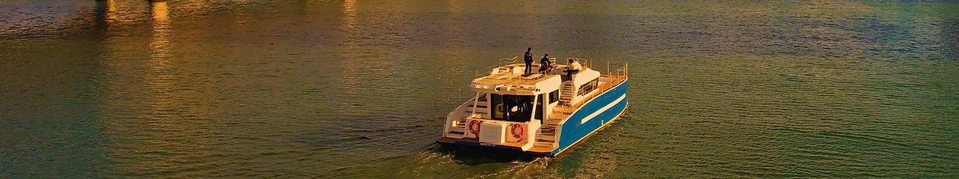 Haeundae River Cruise passing Gwangan Bridge at sunset